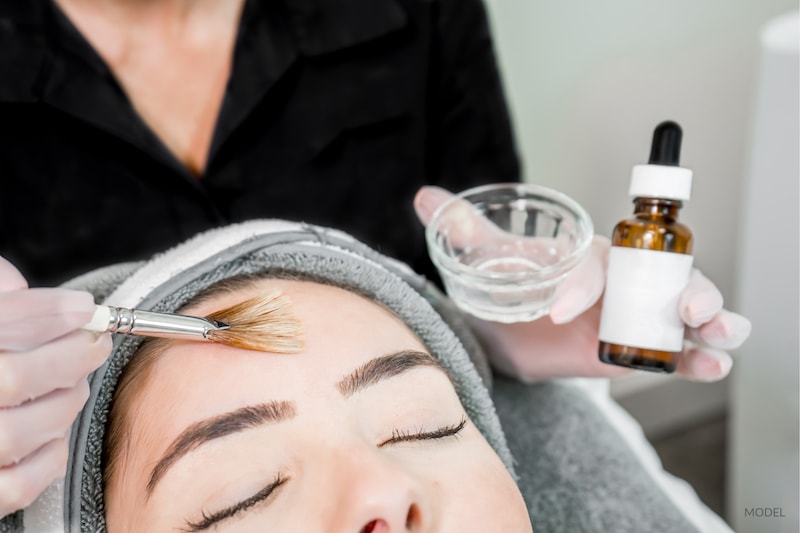 Woman undergoing a chemical peel