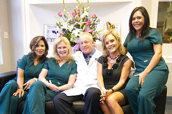 Dr. O'Neil with staff